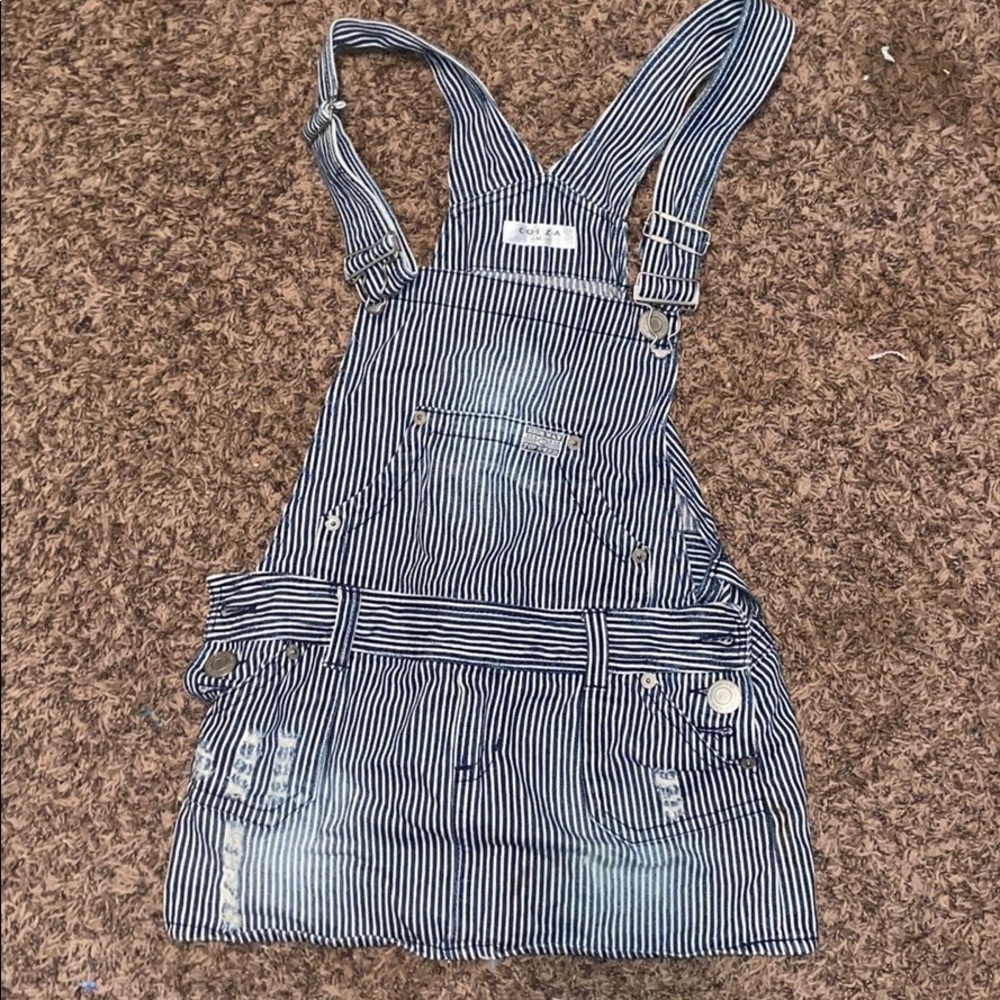 Denim overalls with skirt on bottom